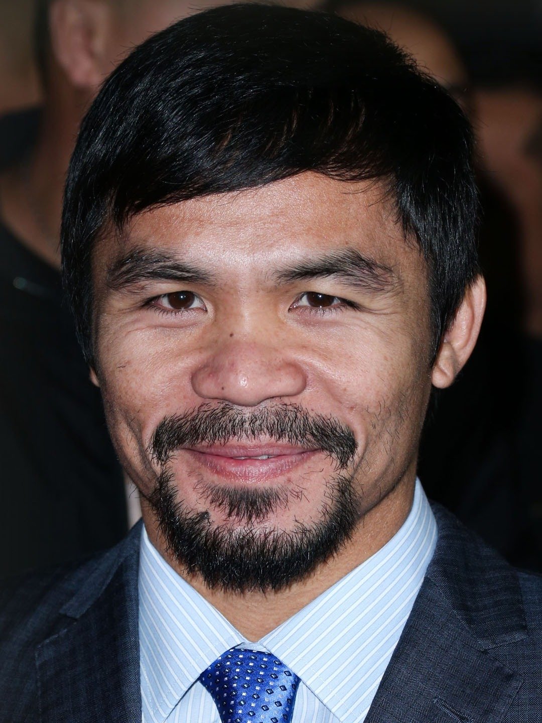 How tall is Manny Pacquiao?